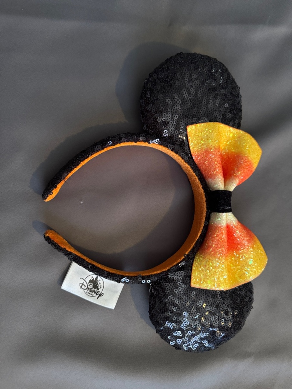 Disney Black Sequin Minnie Headband with Orange-Yellow Glitter Bow